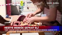 Türk askeri Kabil'de annesinden ayrı düşen bebeğe yardım etti
