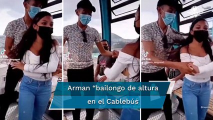 Pareja baila cumbia en cablebús y les llueven las críticas