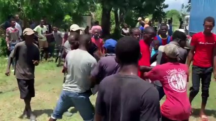 Fighting breaks out over aid distribution after Haiti earthquake