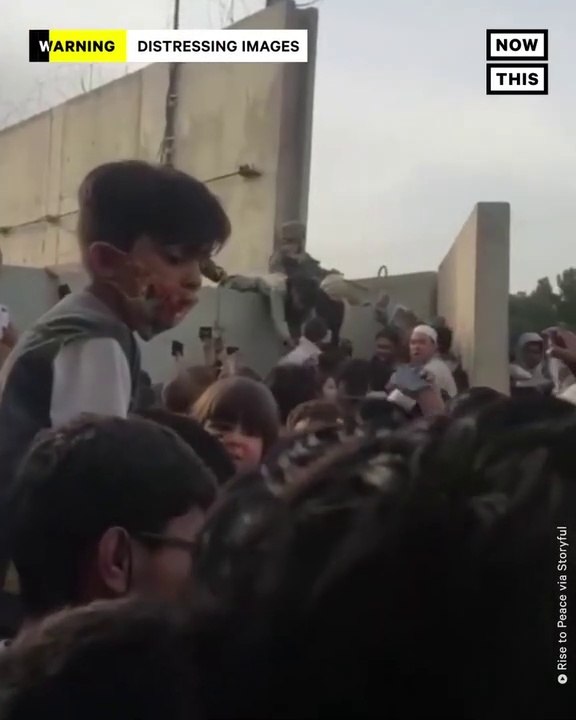 AFGHAN PARENTS DESPERATELY HAND OFF CHILDREN AT KABUL AIRPORT