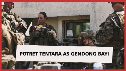 Potret Tentara AS saat Gendong Bayi di Afghanistan