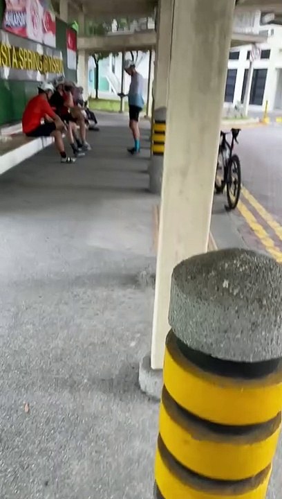 TOUR DE FRANCE GROUP NO WEAR MASK CHIT CHAT AT BUS STOP