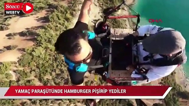 Yamaç paraşütünde hamburger pişirip yediler