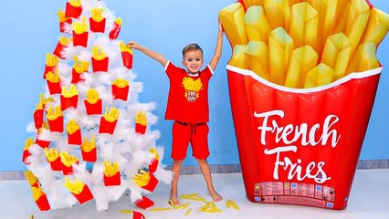 Vlad and Niki pretend play and decorate the Christmas tree