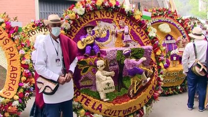 Colombians enjoy the Silleteros parade during the Flowers festival in Medellin