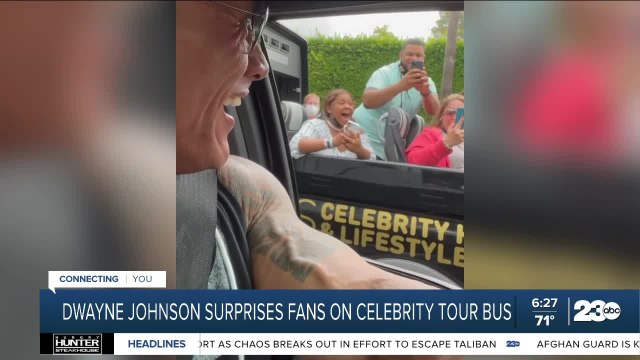 Dwayne The Rock Johnson surprises fans on celebrity tour bus