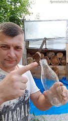 Man Sticks Glass Bottle into Moving Tree Target