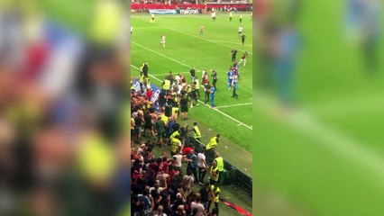 Nice vs Marseille football match suspended after fans storm pitch