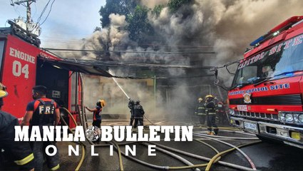 Firefighters respond to a building establishment in Arlington pond, Barangay Sta. Cruz, Cebu City.