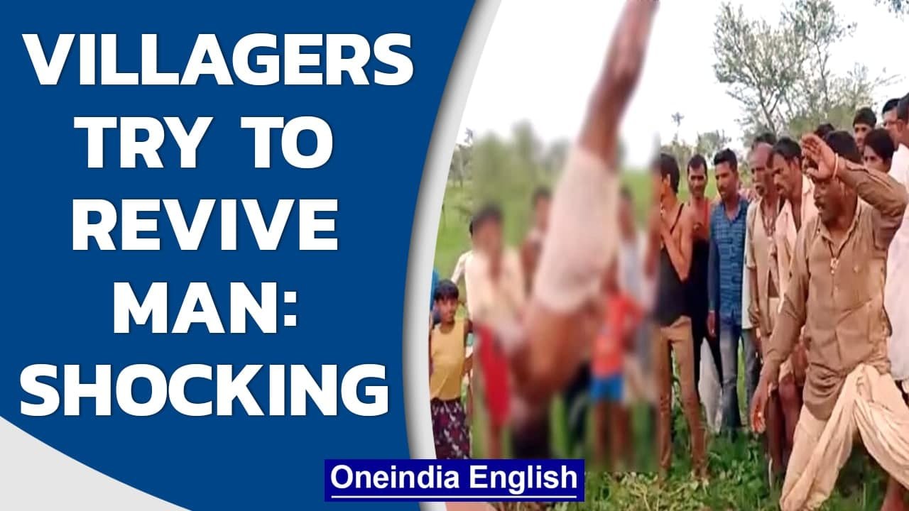 Shocking Villagers try to revive drowned man this way... Oneindia