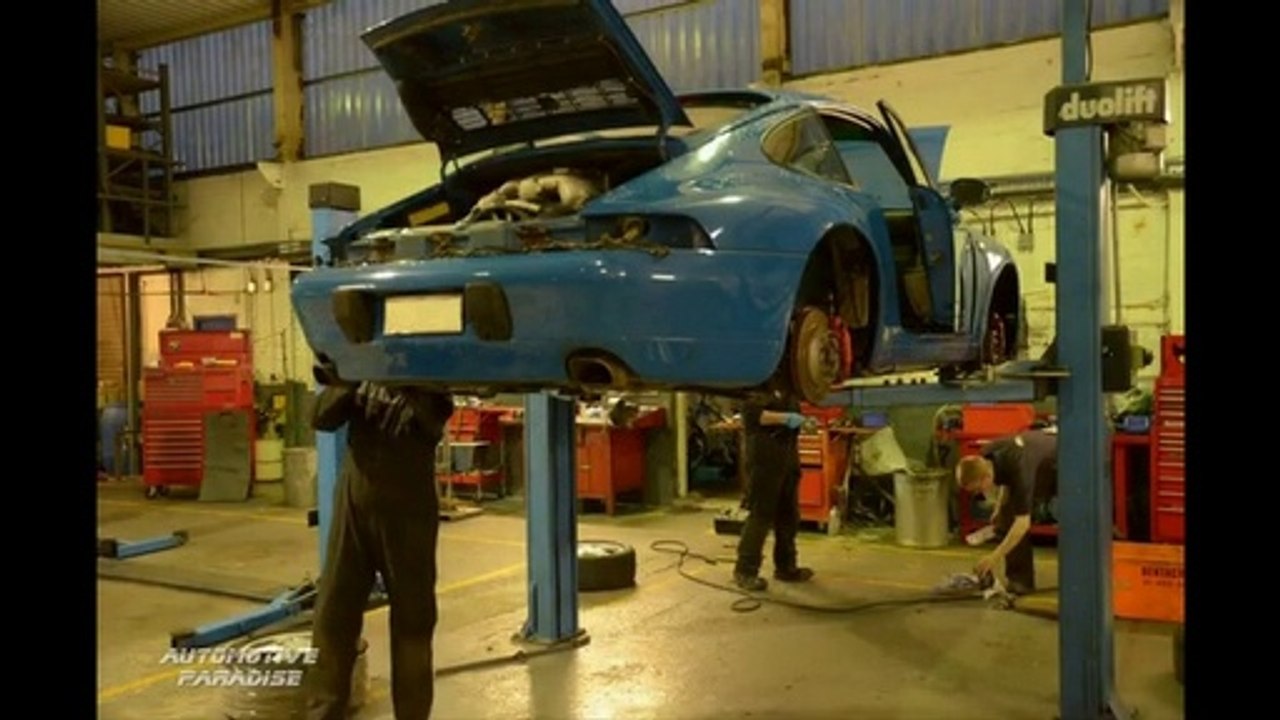 1996 Porsche 993 Carrera 4 Restoration Project on a Celette car bench at Automotive Paradise