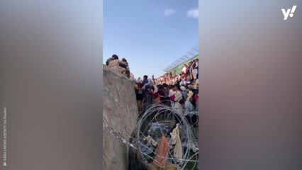 Desperate Afghans continue endless wait outside Kabul airport, some standing in knee-deep water and trash