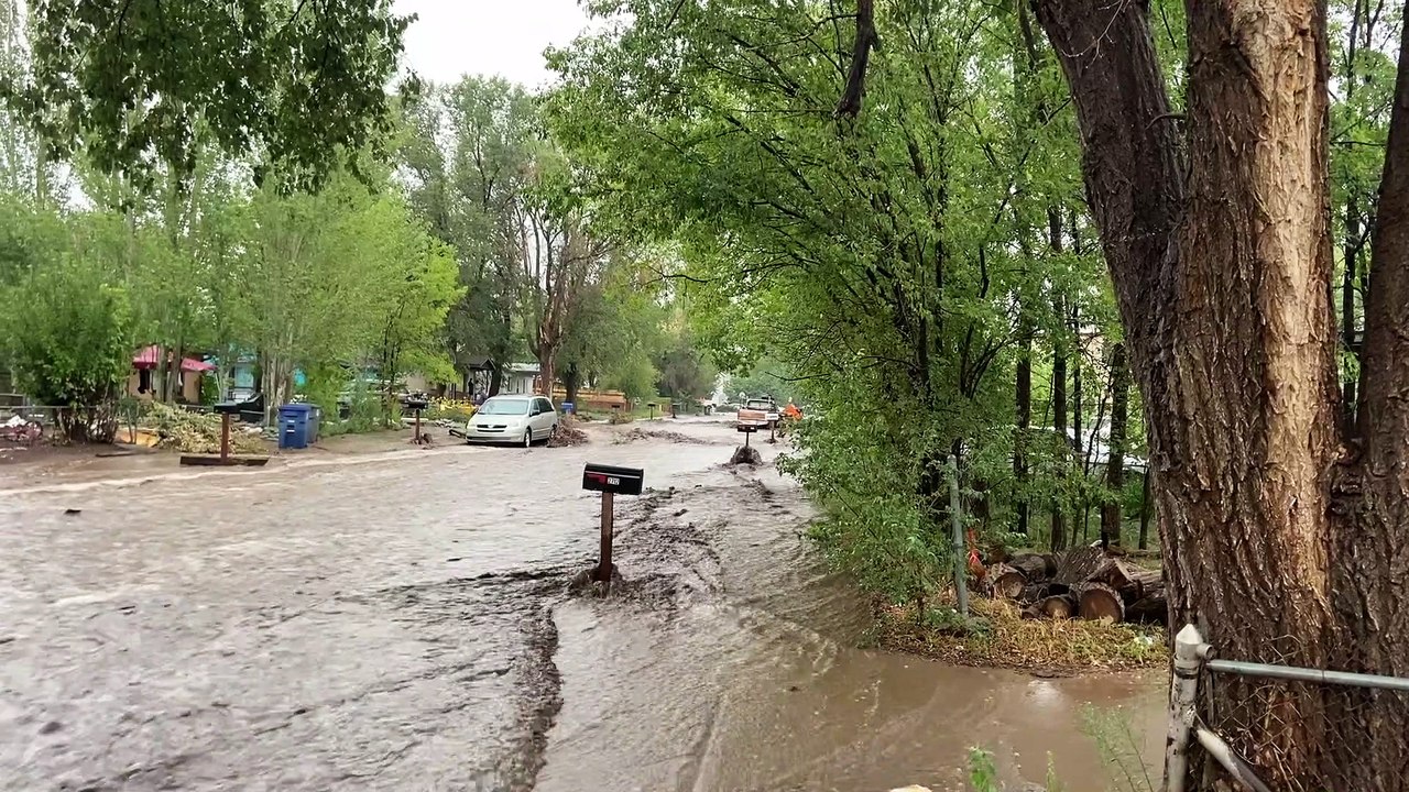 Flash Flooding Sends Coach Floating Down the Street
