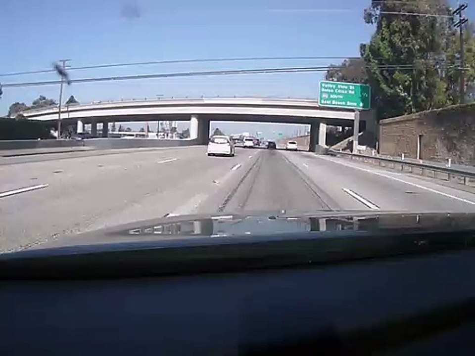 Van Loses Control and Flips on Highway