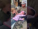 Big Brother Settles Newborn Sister With a Song