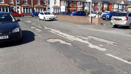 Potholes on Palmer Avenue