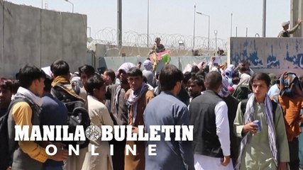 Desperate Afghans wait outside Kabul airport as nations warn of terror threat