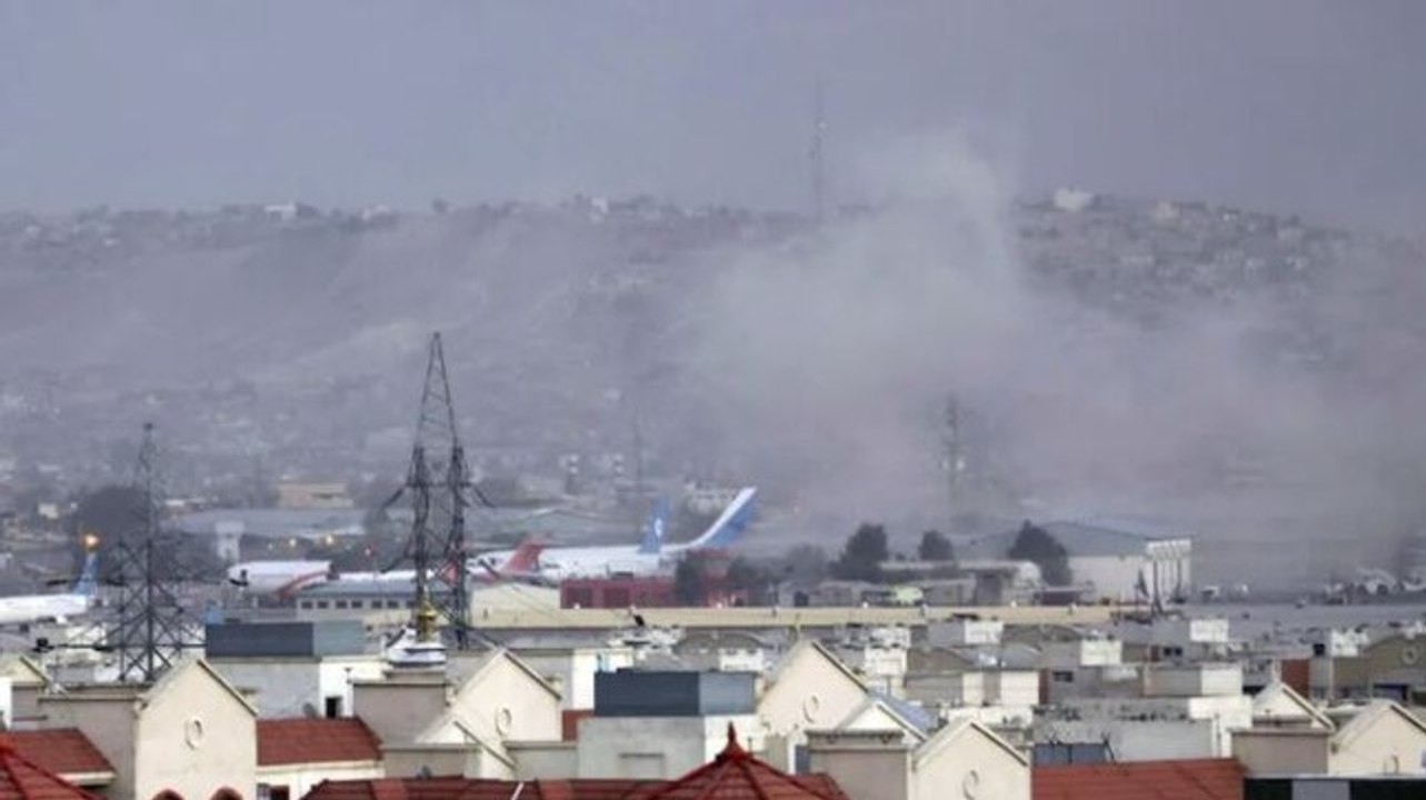 At least 13 killed in twin blasts outside Kabul airport