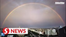 Double rainbow fills Beijing sky after rain