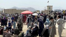 Huge crowd gathered at Kabul Airport despite series blast