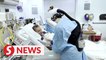 US coronavirus hospitalisations surpass 100,000