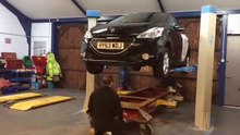 Peugeot 208 crash repair on Celette bench
