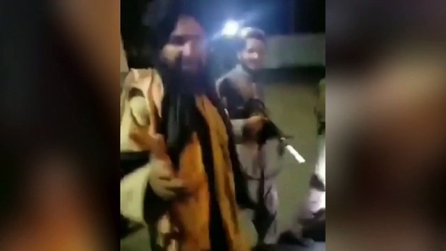 Taliban fighters take Kabul airport amid fireworks and celebratory gunfire as US ends 20-year Afghan war