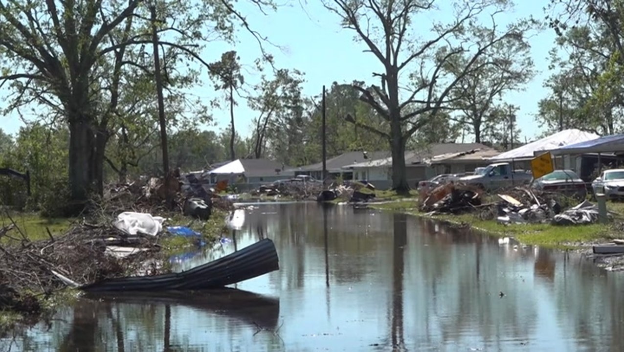 Threatened by one hurricane while damage from another lingers