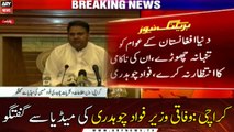 Karachi: Federal Minister Fawad Chaudhry talks to media