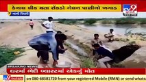 Breach reported in irrigation canal at Radhanpur's village, locals rush to repair _ Patan _ TV9News