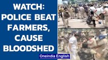 Haryana Police baton charges farmers protesting at Bastara toll plaza area in Karnal | Oneindia News