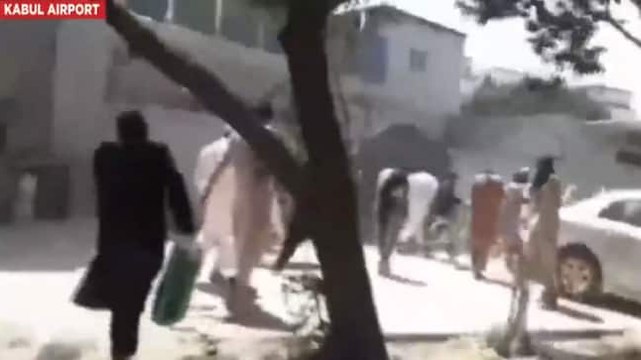 Gunshots heard outside Kabul airport as Afghans try to flee Taliban rule