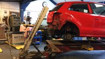 VW Polo collision repair straightening process on a Celette MUF 7 car frame machine , part 2