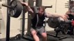 Guy Loses his Balance While Lifting Weights and Falls Over Backwards