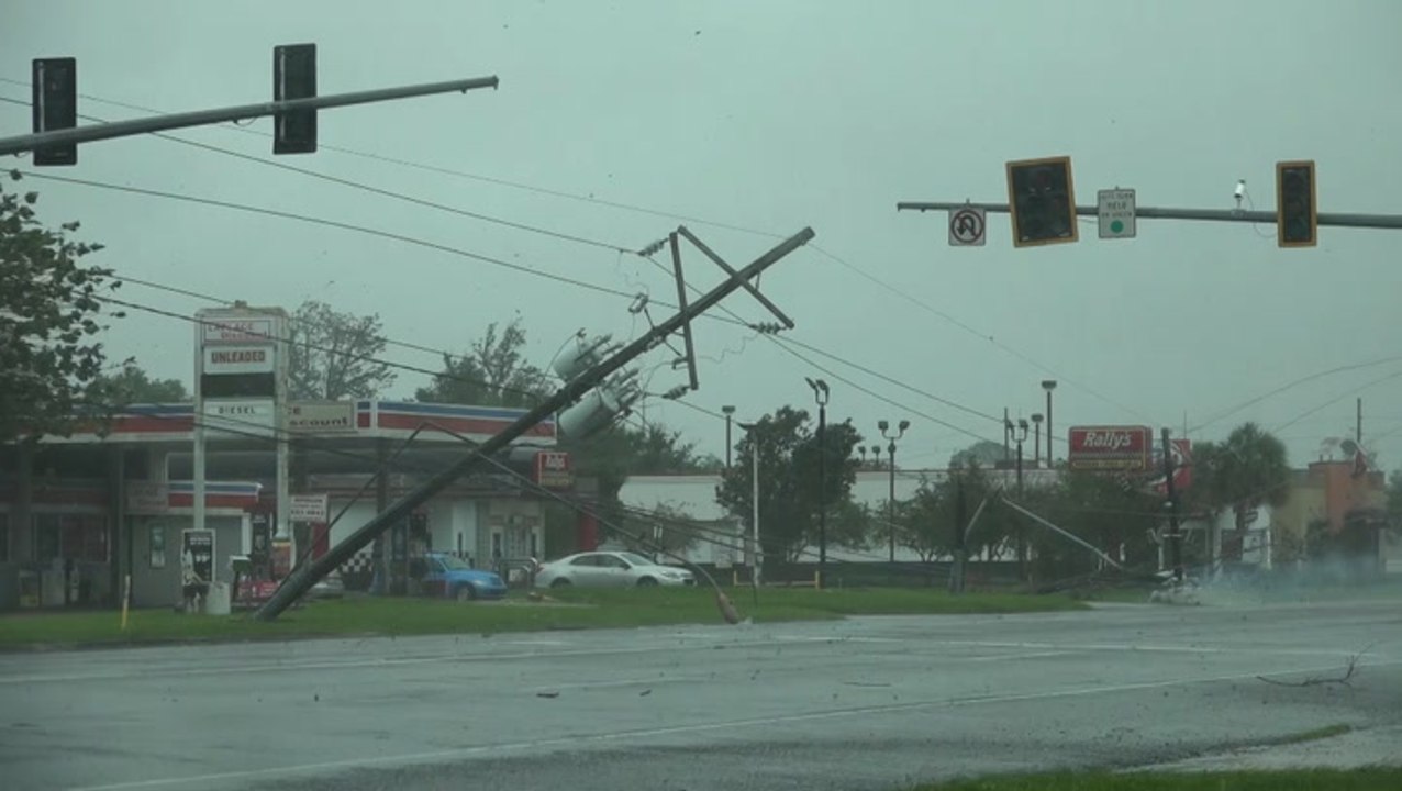 Ida's intense winds knock power poles to the street