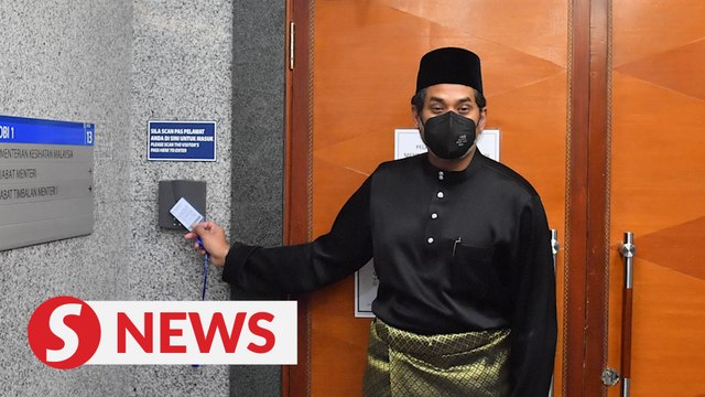 Khairy clocks in to work as Health Minister