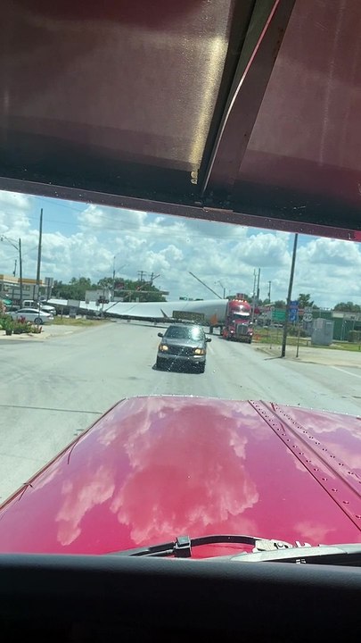 Train Cuts Through Wind Blade at Crossing