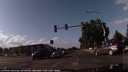 Train Horn in a Small Car Surprises Red Light Runner