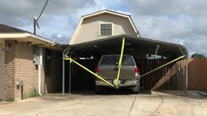 Truck Tied to Car Canopy in Preparation for Hurricane Ida