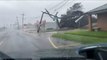 Dash cam captures Ida's winds ripping roof off building