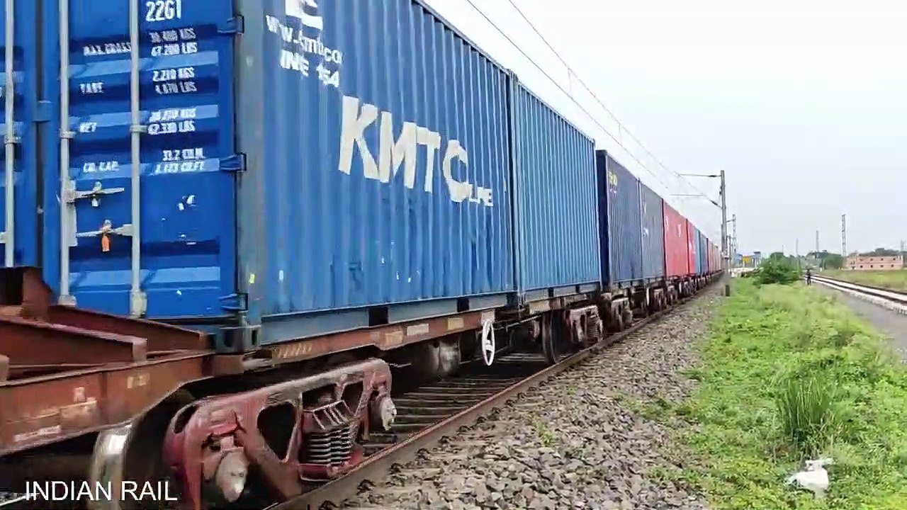 KAZIPET WAG-9 (THE GREEN BEAST) PULLING A LONG CONTAINER TOWARDS BARDDHAMAN __ INDIAN RAILWAY