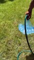 Travis, Stormi, & Kylie playing w/ water balloons 