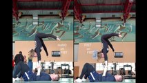 Partners Show Impressive Balance Skills While Performing Handstand On Top Of the Other