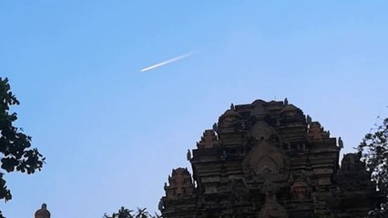 Meteor fireball lights up sky at midday. Po Nagar Cham Towers, Viet Nam 2021.