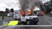 Normalistas queman vehículos y bloquean carretera en Michoacán