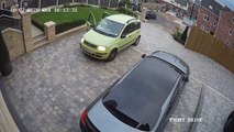 Poorly Parked Parcel Delivery Car Drifts Down Driveway