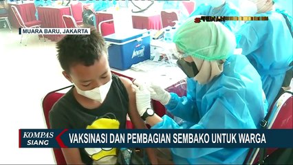 Vaksinasi dan Pembagian Sembako untuk Warga di Pasar Ikan Modern Muara Baru