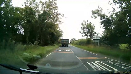 Tractor Hits Overtaking Van
