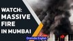 Mumbai: Fire breaks out in a 7-storeyed residential building in Borivali | Watch | Oneindia News