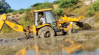 Massey Ferguson tractor stuck in mud and pulling out by jcb tractor video